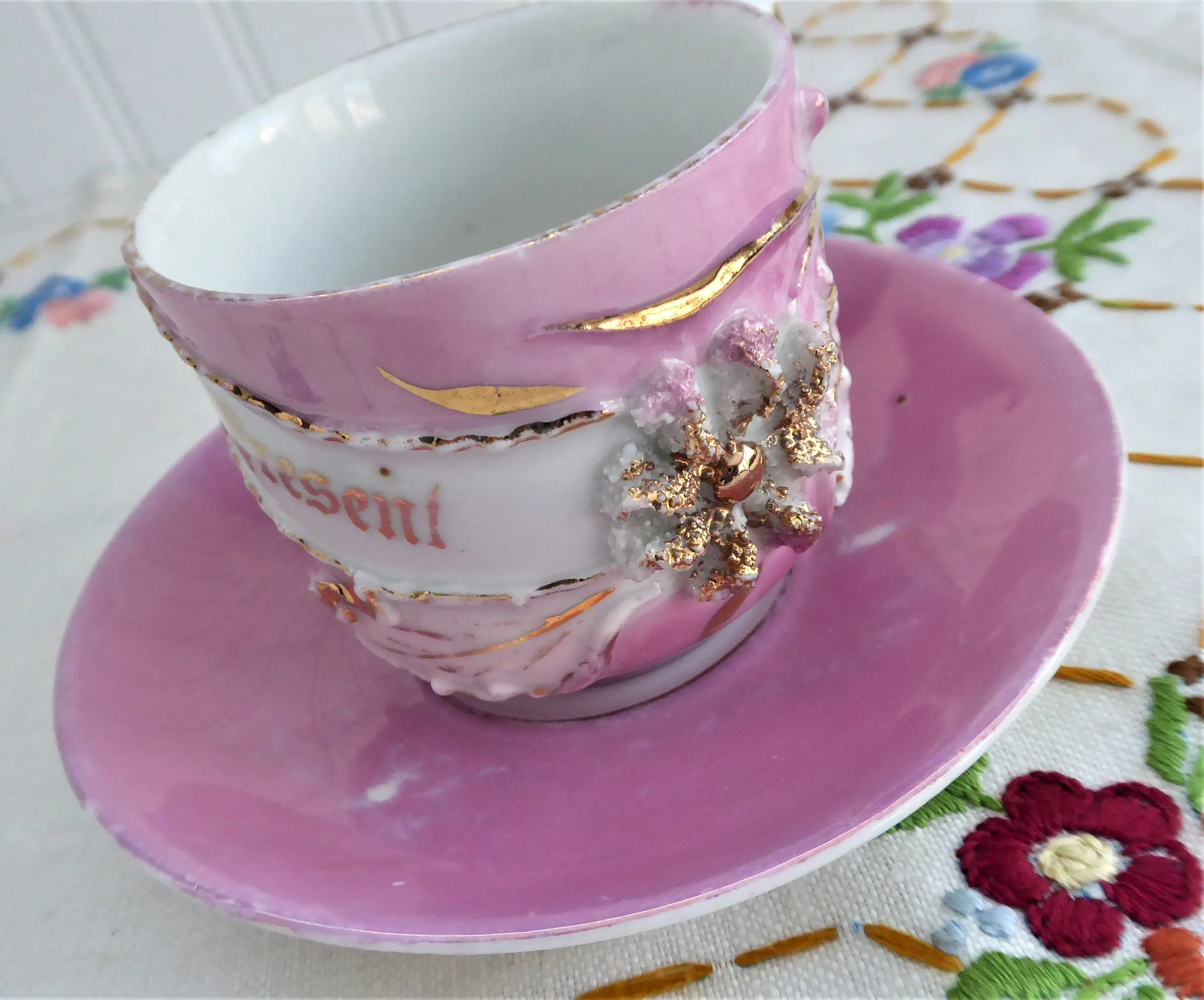 A Present Pink Luster Victorian Souvenir Cup And Saucer Raised Gold Flower 1890s Copper Luster