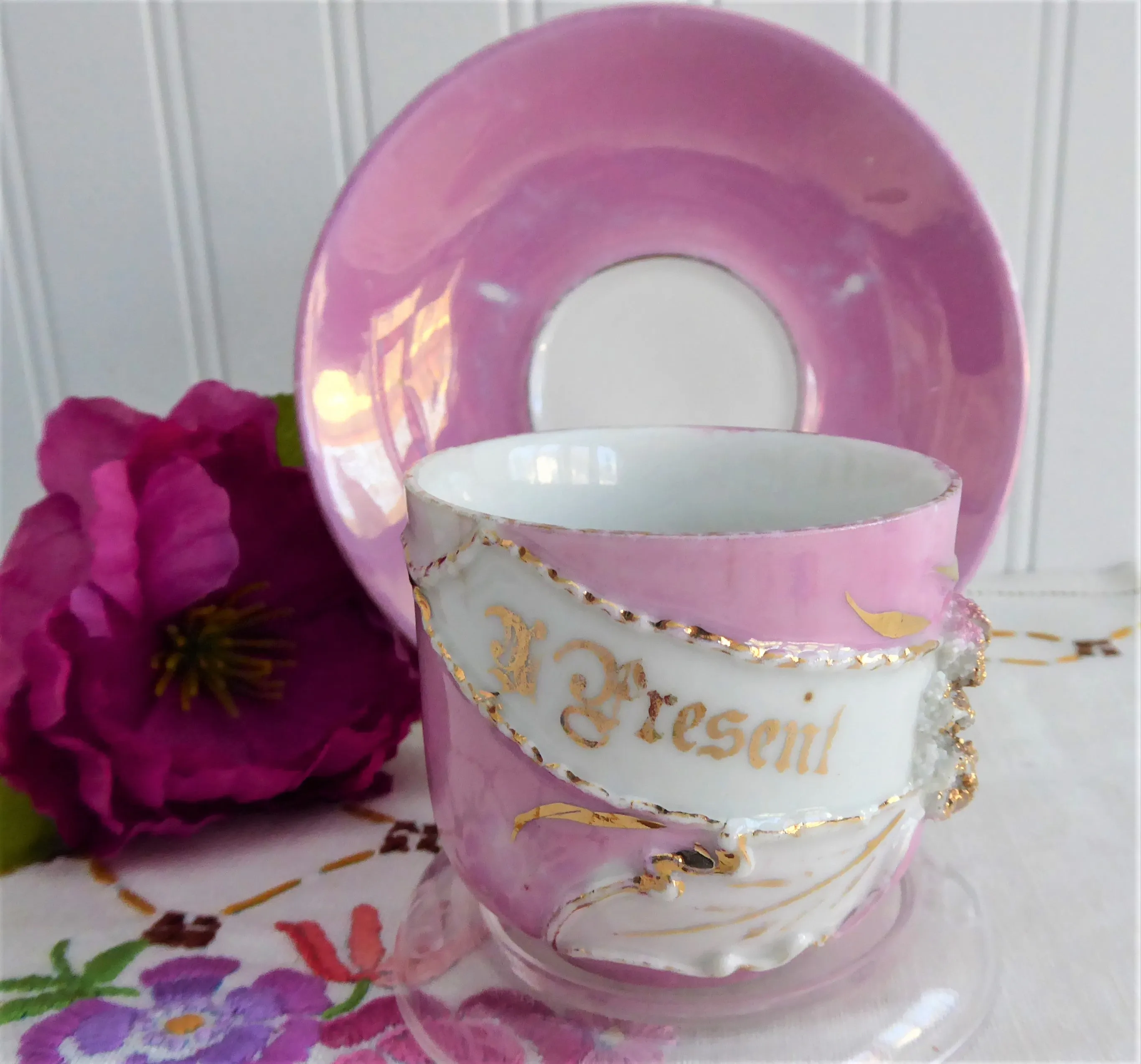 A Present Pink Luster Victorian Souvenir Cup And Saucer Raised Gold Flower 1890s Copper Luster