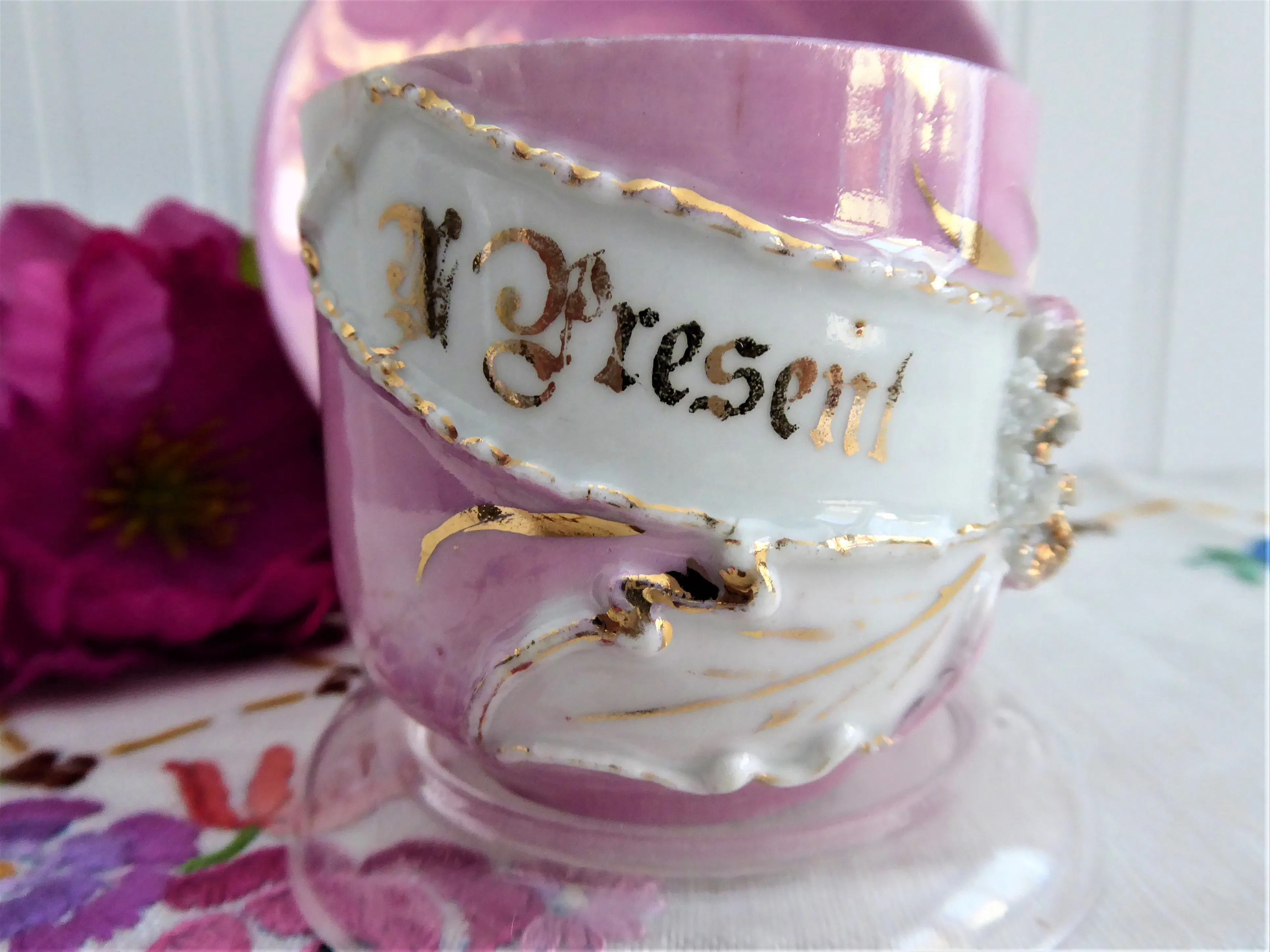 A Present Pink Luster Victorian Souvenir Cup And Saucer Raised Gold Flower 1890s Copper Luster