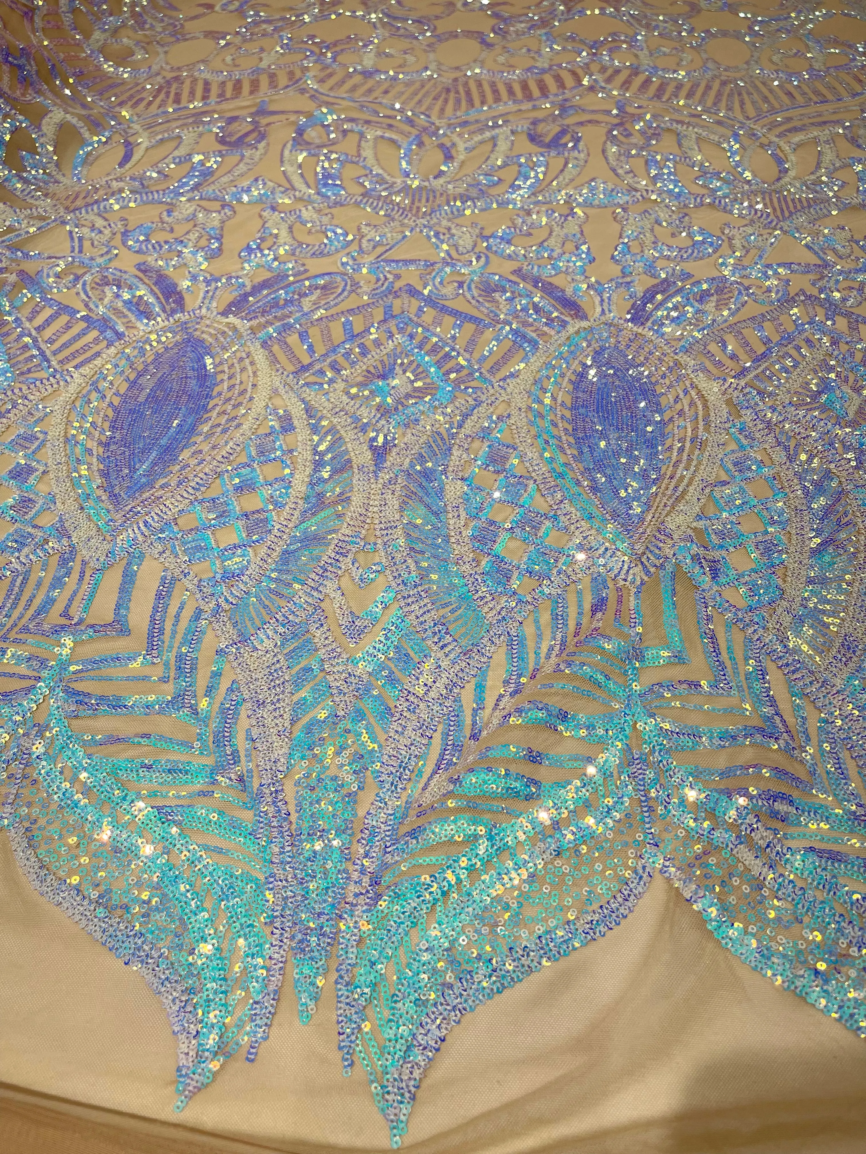 Aqua Clear iridescent royalty design on a nude 4 way stretch mesh-prom-sold by the yard.