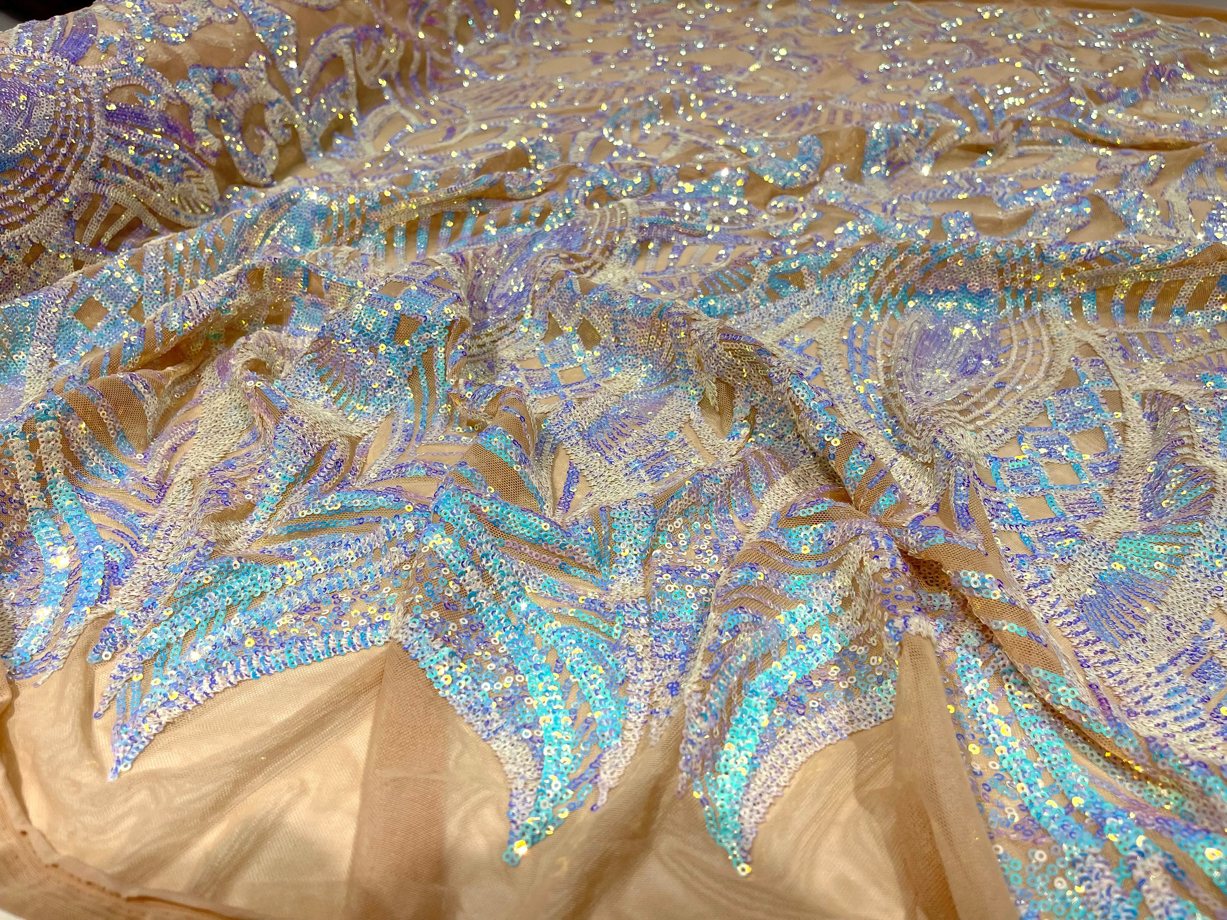 Aqua Clear iridescent royalty design on a nude 4 way stretch mesh-prom-sold by the yard.