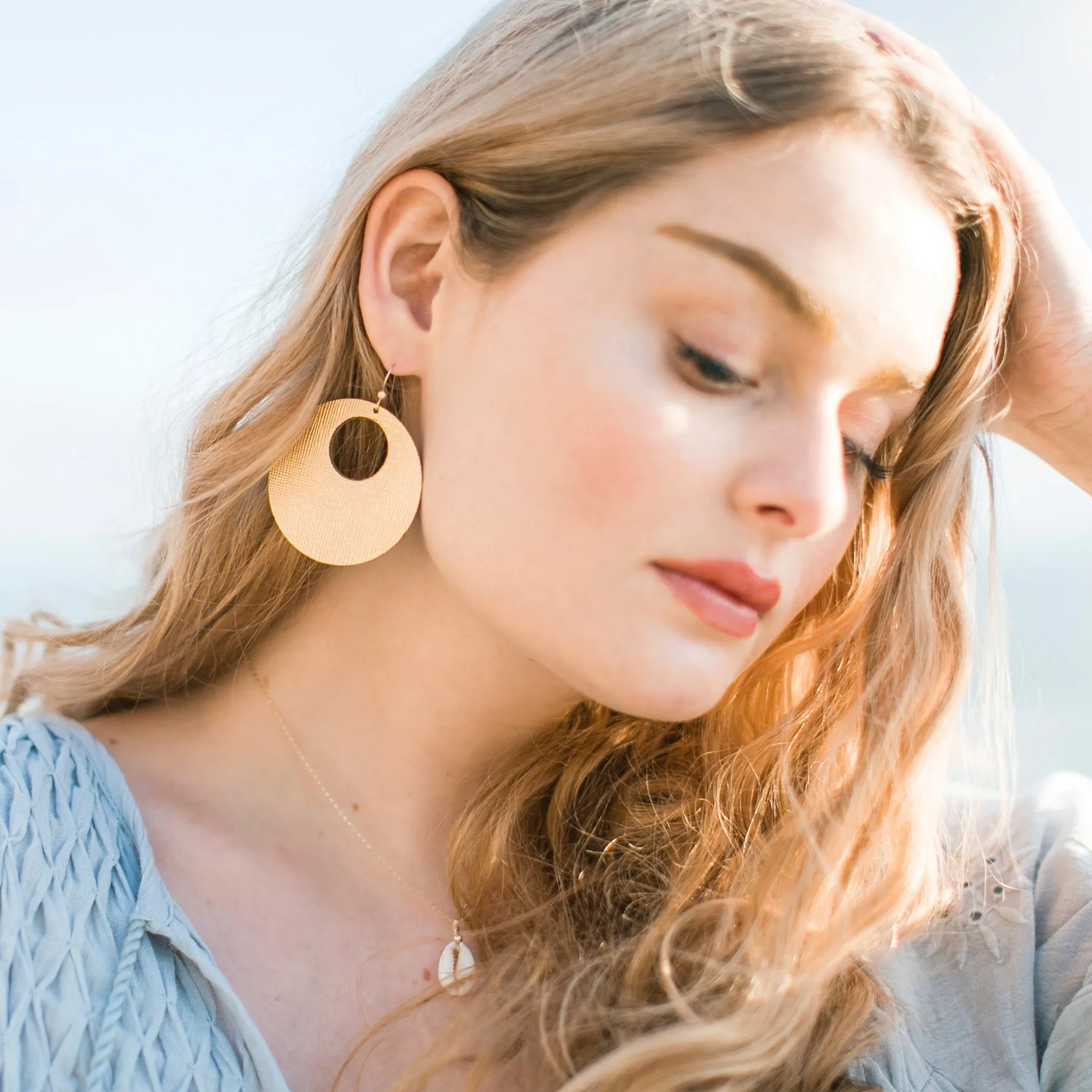 Gold Luster Revolve Leather Earrings